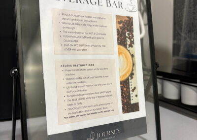 Coffee and beverage station sign in the welcoming office of Journey Psychology in Sherwood Park.
